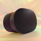 Sonos Era 300 Smart Speaker - Black - angled front left view on tie-die background