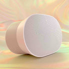 Sonos Era 300 Smart Speaker - White - angled front left view on tie-die background